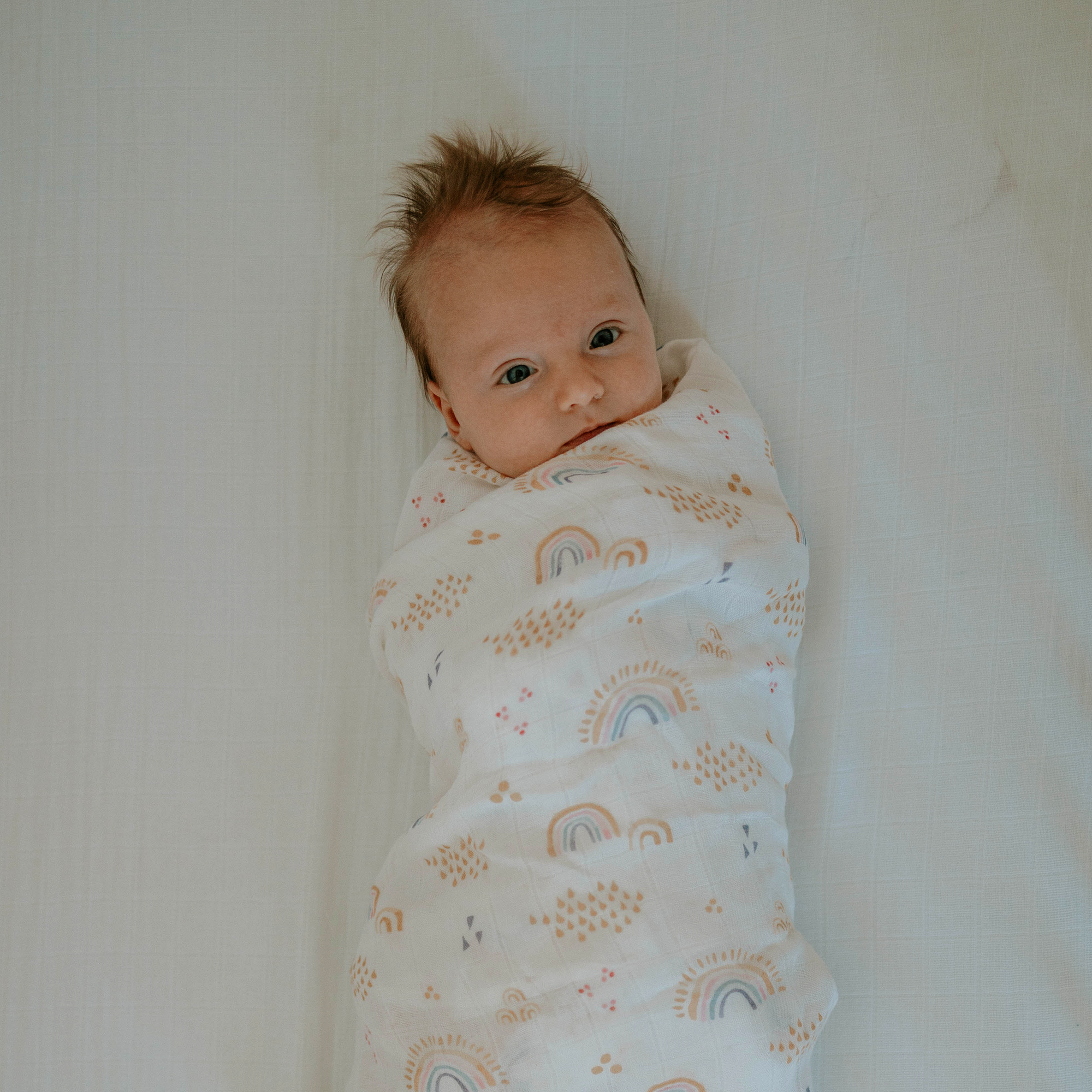 Deluxe Muslin Swaddle Blanket - Rainbows &amp; Raindrops